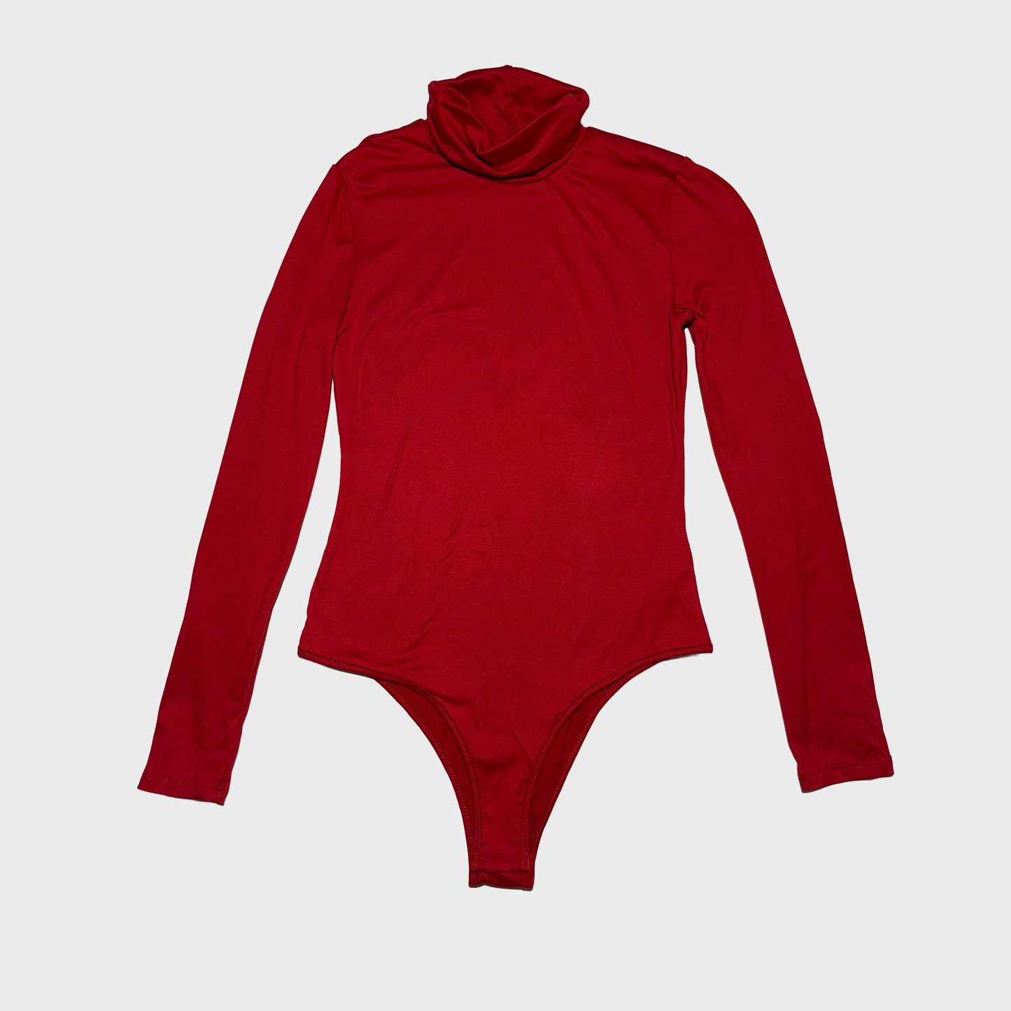 Body rojo manga larga cuello alto