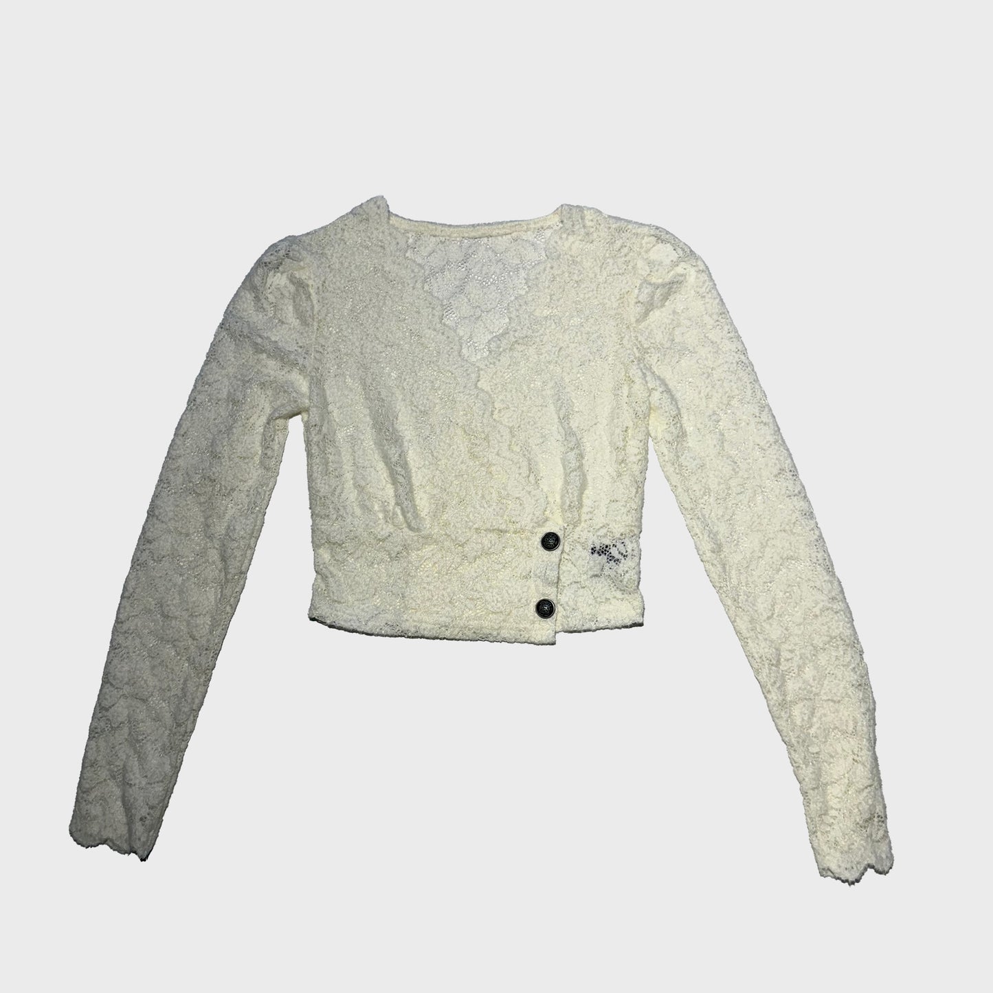 Blusa de encaje blanca cruzada