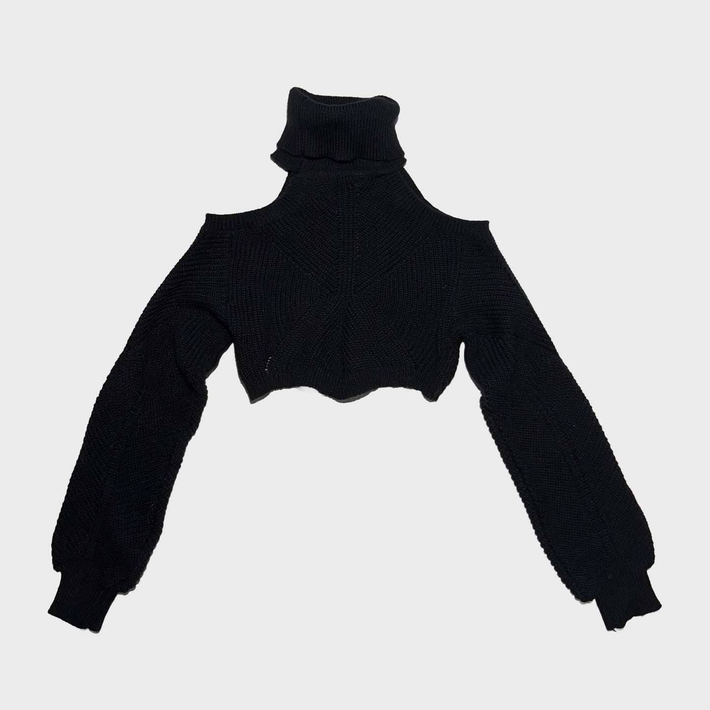 Blusa negra corta manga larga