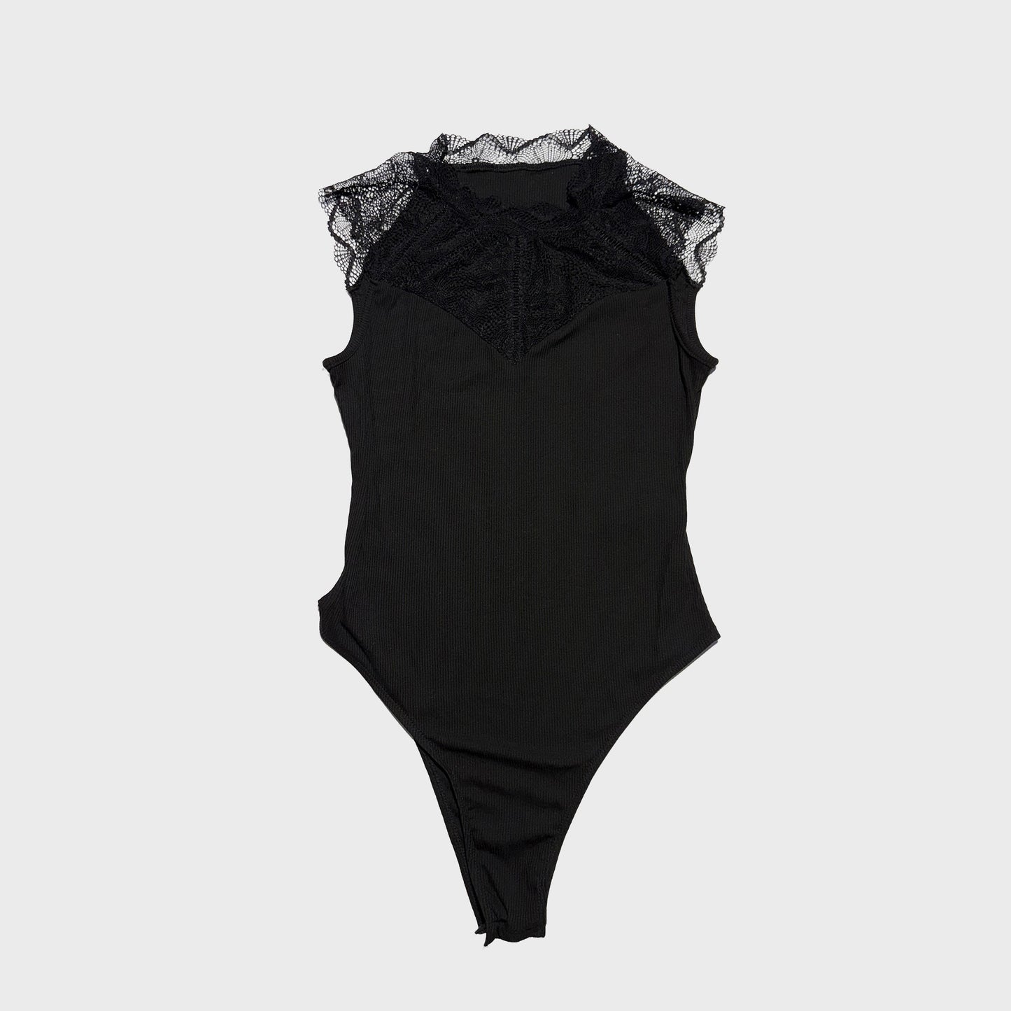 Blusa sin manga con encaje en cuello